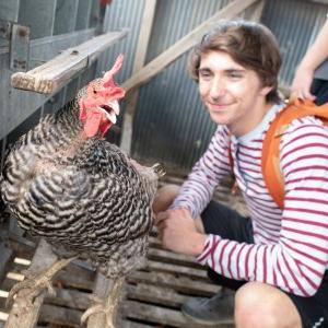 Student next to a turkey